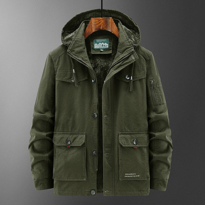Detail of the durable fabric and zipper closure on a men's cold weather parka jacket