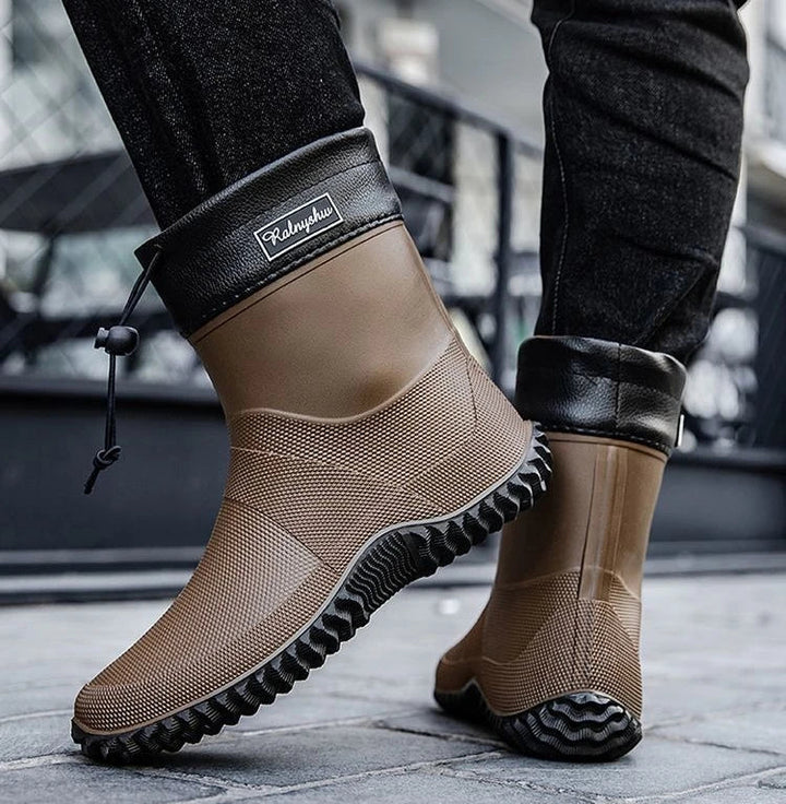 Side view of men's waterproof ankle work boots, non-slip outsole, sturdy construction, outdoor