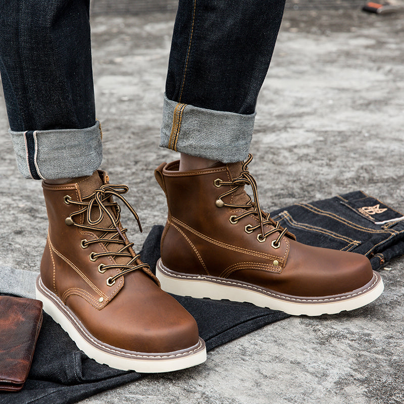 Men's waterproof chukka boots from a low angle, emphasizing their solid and robust build