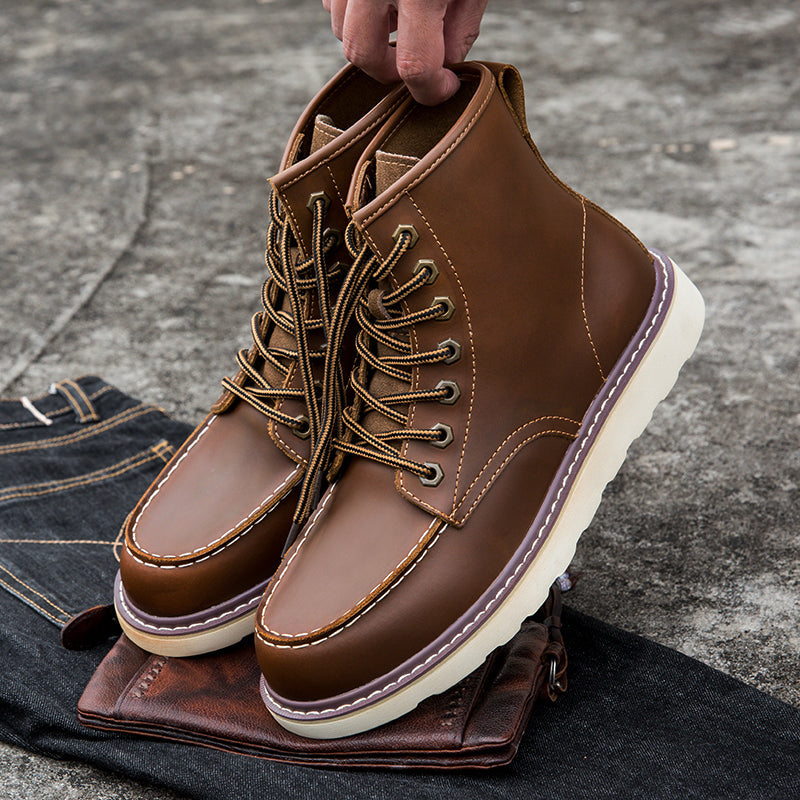 Back view of the men's waterproof chukka boots, showcasing heel design and brand detailing