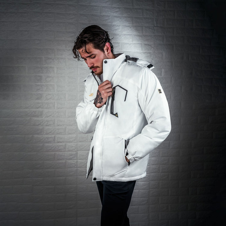 Detail of men's waterproof blue jacket, showing taped seams for protection.