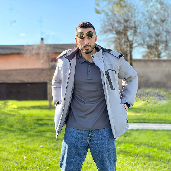 Back of black men's outdoor wear jacket, clearly showing silhouette.