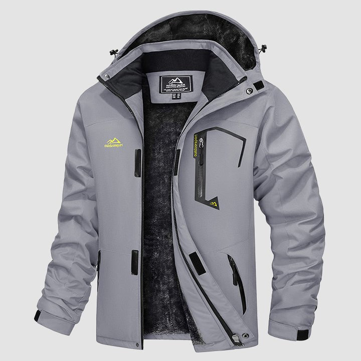 Men's waterproof performance shell ski jacket in black, front view, urban setting.