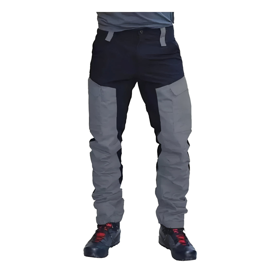 Men's weatherproof cargo work pants for outdoor use, featuring reinforced stitching and multiple utility pockets.