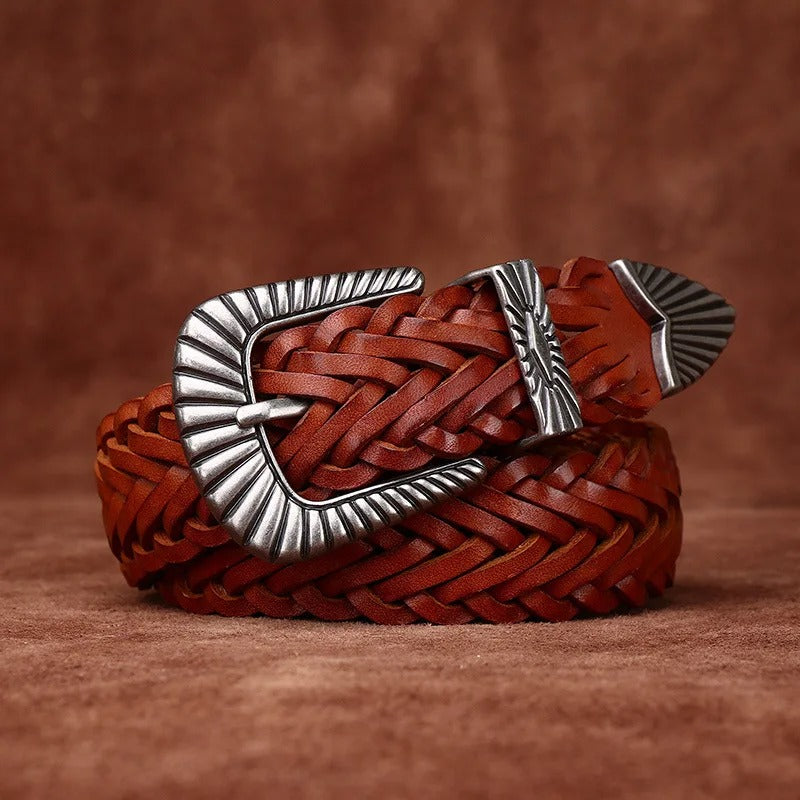 Detailed shot of men's dark brown full grain braided leather belt texture, western look