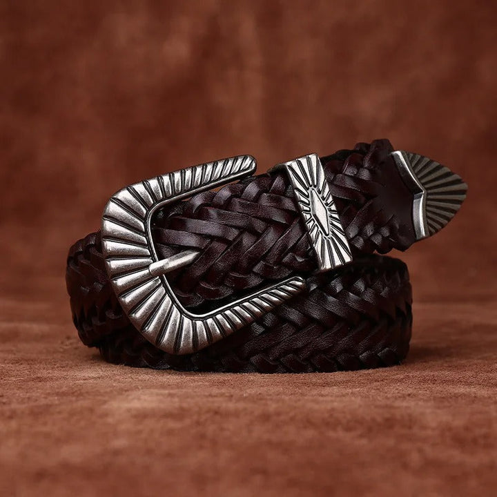 Close-up of the buckle on a men's black braided full grain leather western belt