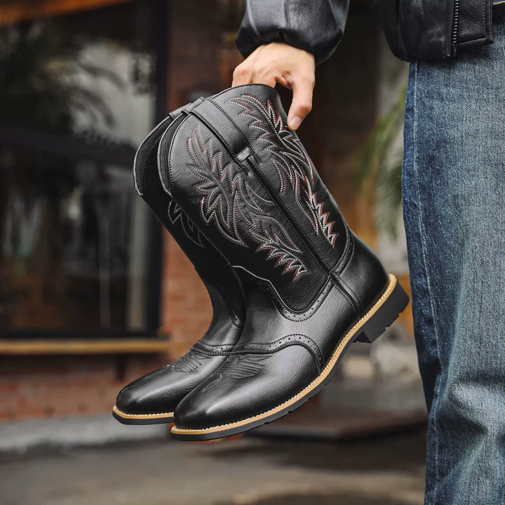 Side view of men's leather cowboy boots, ideal for casual wear, showcasing stitching detail