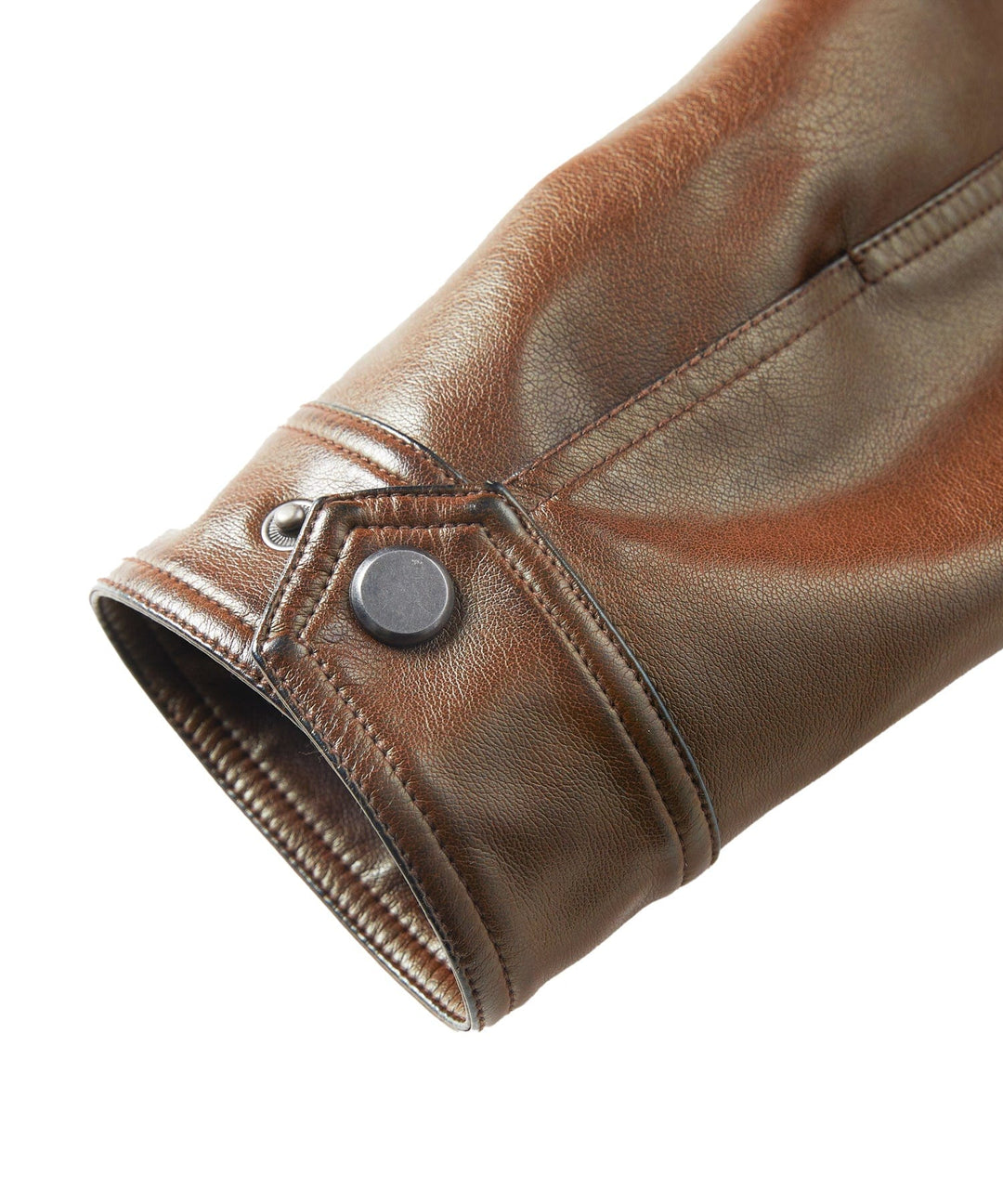 Front pocket detail of a mens winter aviator jacket in PU leather, with button closure and stitching