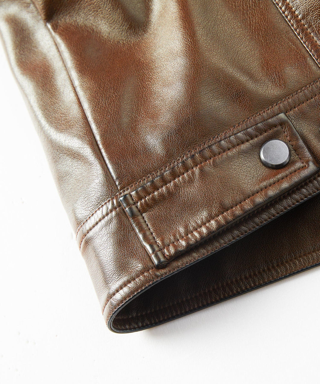 Side profile of men's dark brown aviator jacket, showcasing shearling collar and fitted silhouette