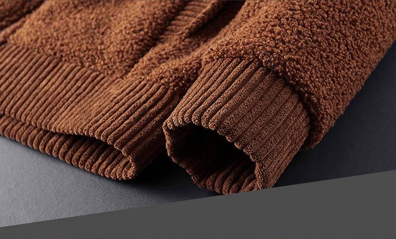 Detail of the warm cashmere blend lining inside a men's hooded fleece jacket
