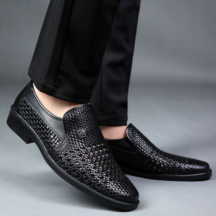 Classic men's woven leather slip-on shoes, a staple for any wardrobe, bridging casual to formal.
