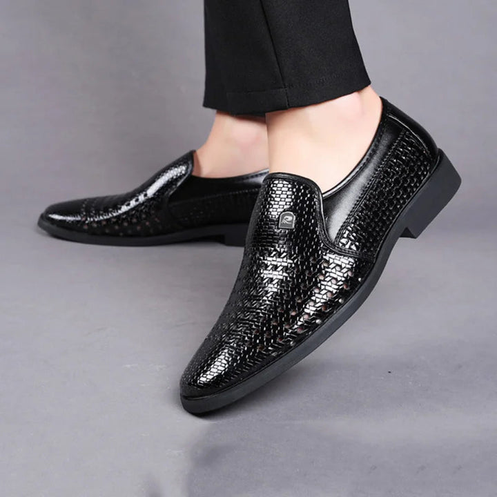 High-quality men's formal footwear: slip-on woven leather loafers in a timeless and versatile design.