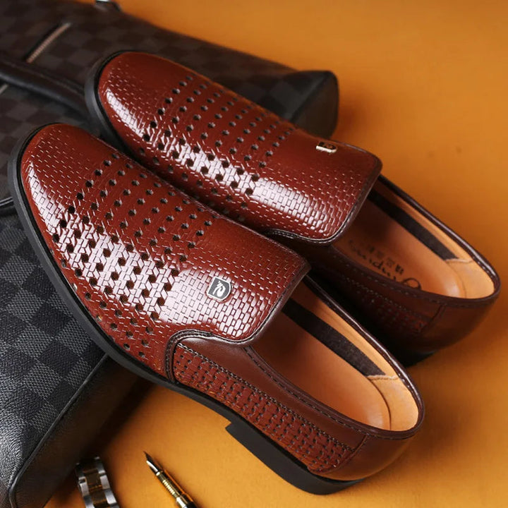 Front view of men's slip-on woven leather loafers, emphasizing the comfortable and easy-to-wear style.