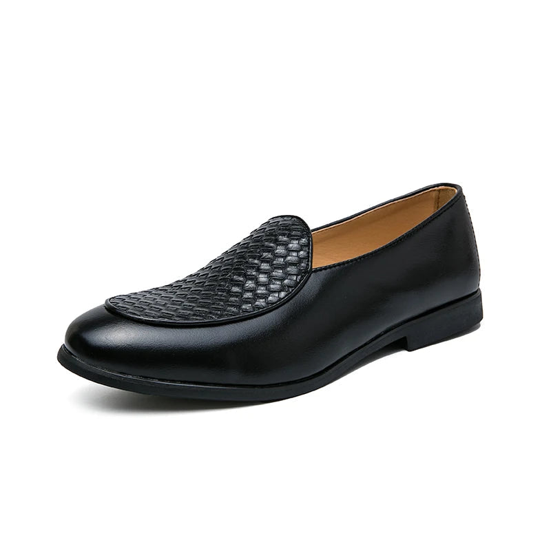 Close-up of intricate woven leather detail on men's slip-on loafers, showcasing craftsmanship