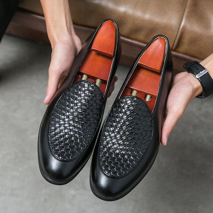 Stylish men's leather loafers, black woven design, ideal for comfortable daily footwear