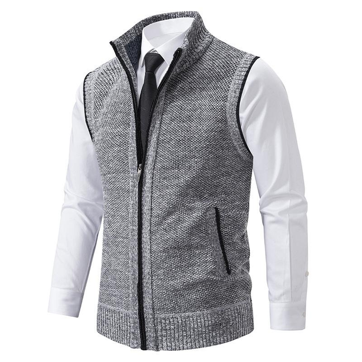Man wearing a sleek mock neck zip vest for a smart casual look, great for autumn layering. Comfortable gilet.