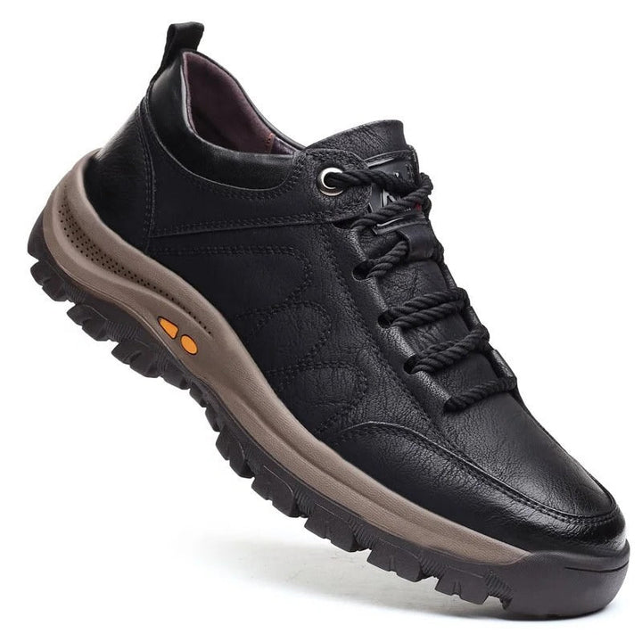 Men's brown orthopedic shoe with waterproof features and ergonomic design.