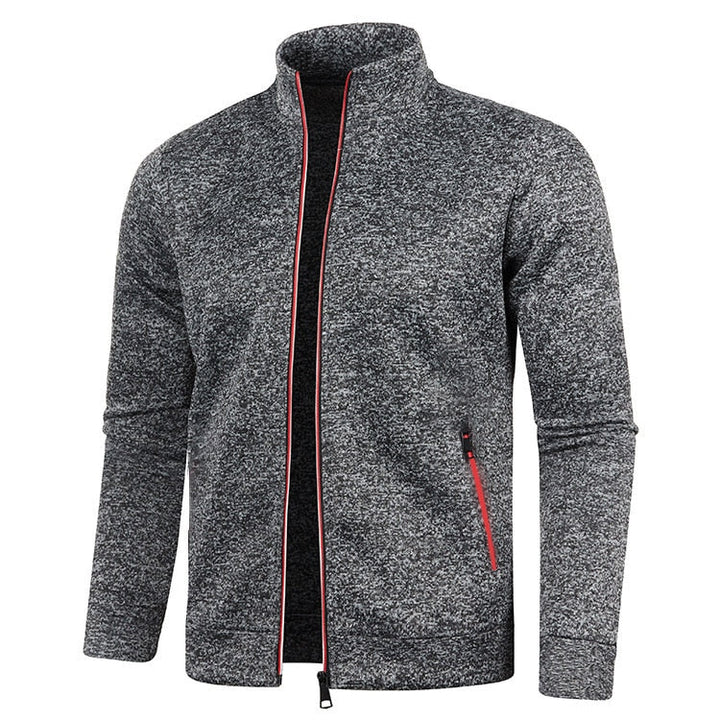 Men's zippered lightweight outdoor jacket, designed for cool weather protection. Essential for travel and active use.