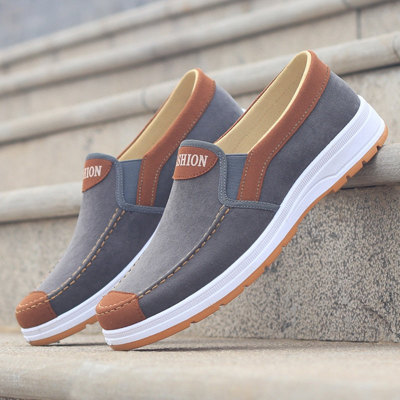 Comfortable men's walking shoes, Matteo canvas slip-ons for daily wear.