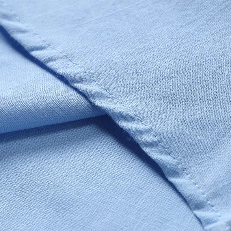 "Men's textured polo shirt with chest pocket, short sleeves, turn-down collar, and relaxed fit for warm-weather comfort."