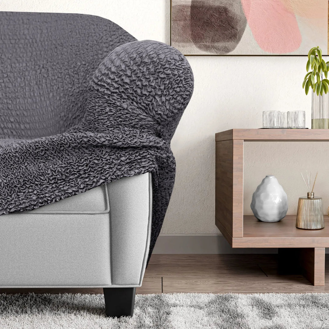 "Microfiber 3-seater recliner slipcover in light grey, versatile fit; transforms decor with protective, stylish cover."