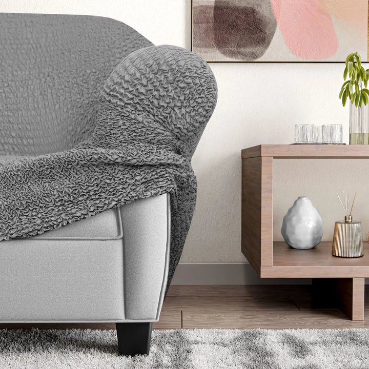 "Microfiber 3-seater recliner slipcover in light grey, versatile fit; transforms decor with protective, stylish cover."