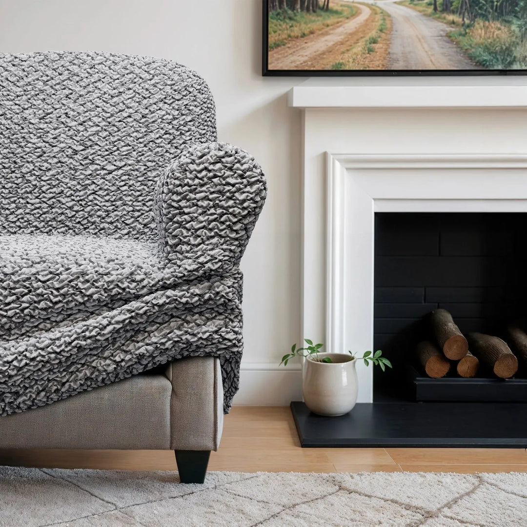 "Microfiber 3-seater sofa slipcover in various colors, showcasing a snug fit and elegant texture for enhanced decor."