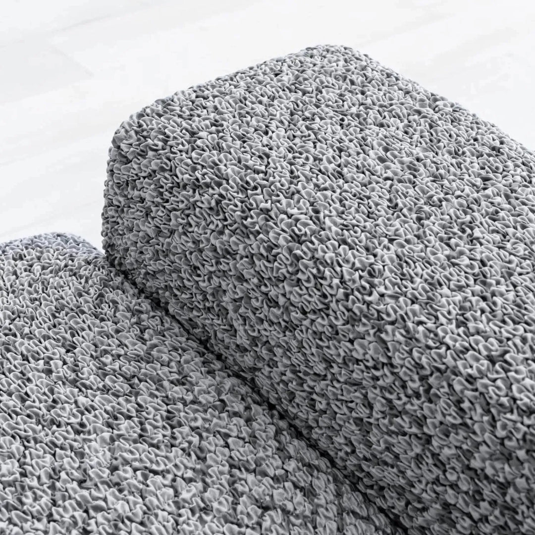 "Microfiber 3-seater sofa slipcover in various colors, showcasing a snug fit and elegant texture for enhanced decor."