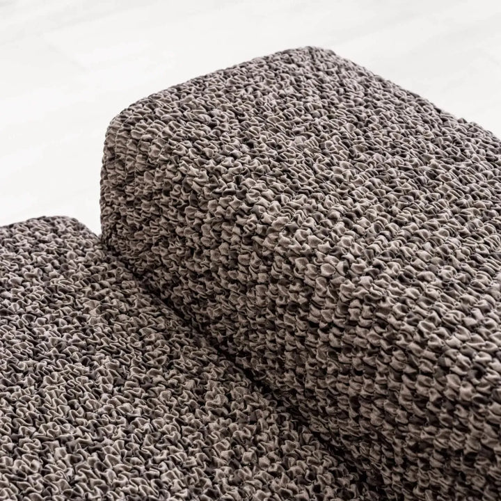 "Microfiber 3-seater sofa slipcover in various colors, showcasing a snug fit and elegant texture for enhanced decor."