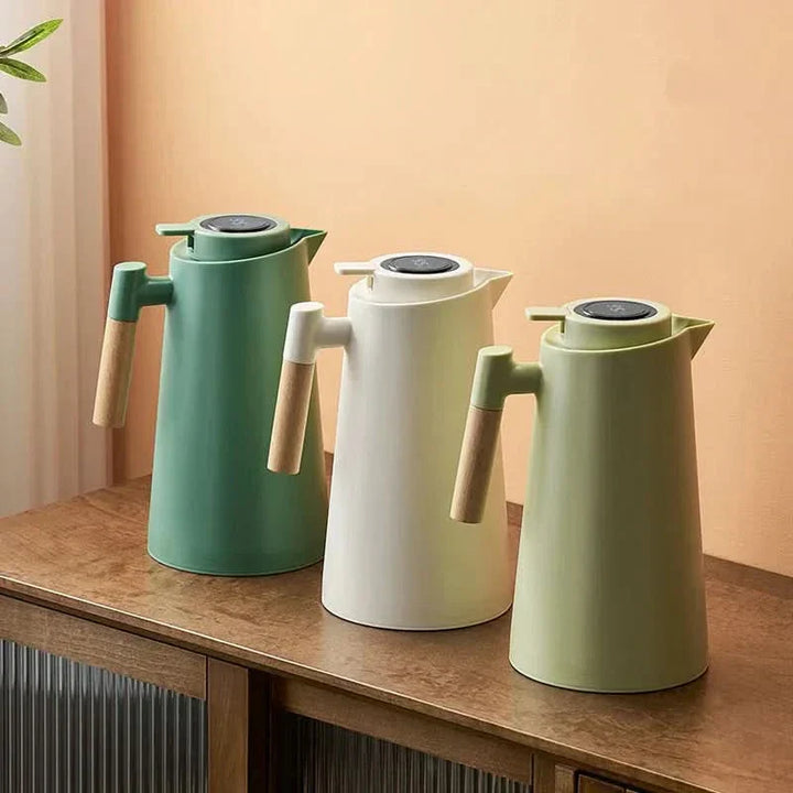 Sleek 1-liter insulated jug, a kitchen gadget for keeping beverages hot or cold with temp display.