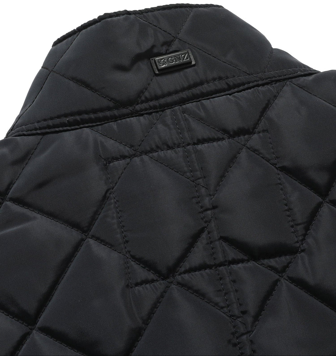 Women's quilted vest in a rich brown, perfect for autumn layering and adding warmth.