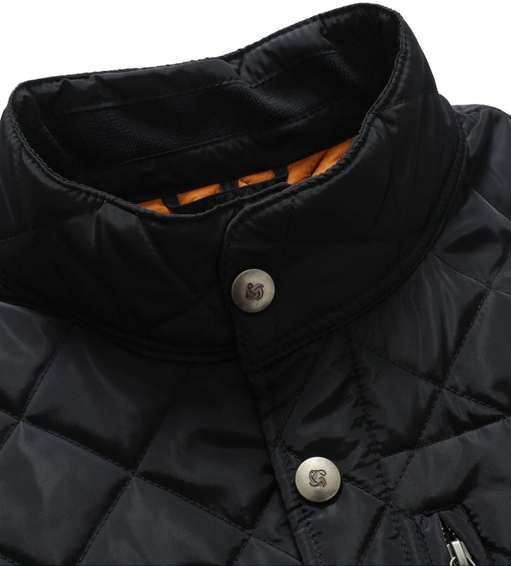 Stylish women's quilted vest, three-quarter view, featuring intricate stitching and a flattering fit.