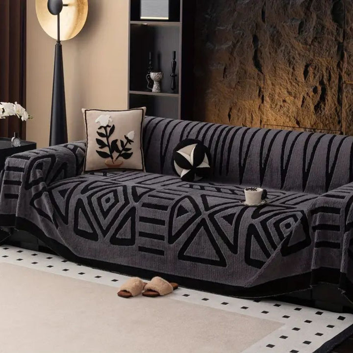 Washable microfiber jacquard sofa cover. Non-slip, pet-friendly furniture protector with a modern urban maze design.