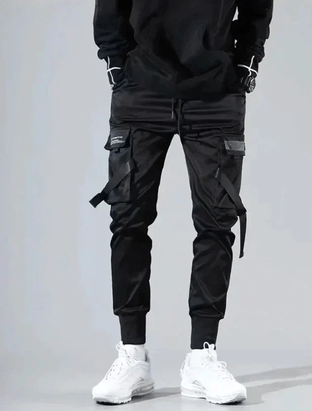 Athletic fit men's multi-pocket cargo pants, blending hip-hop style with functionality.