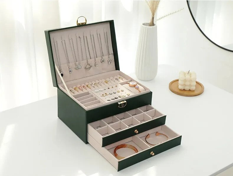 3-tier leather jewelry organizer on a vanity table, keeping women's accessories tidy and displayed.