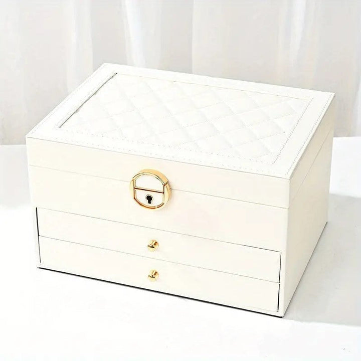 Luxurious 3-tier jewelry storage organizer, an elegant leather keepsake box enhancing any dresser decor.
