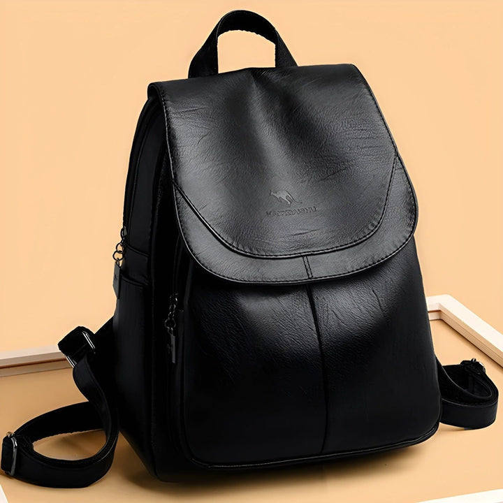 Elegant women's leather office backpack, a sophisticated fashion accessory for professionals & daily commuting.