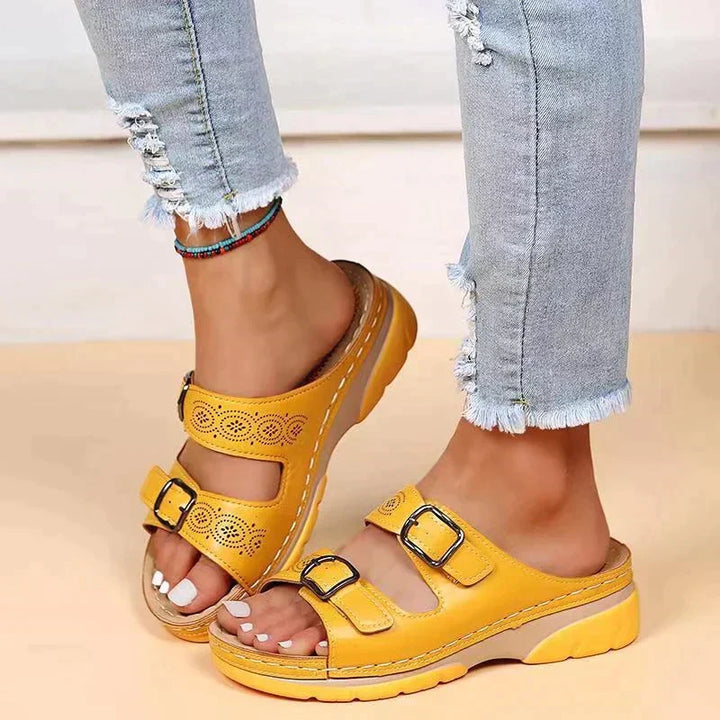 Adjustable women's orthopedic sandals with dual buckles, providing ultimate comfort & foot support for all-day wear.