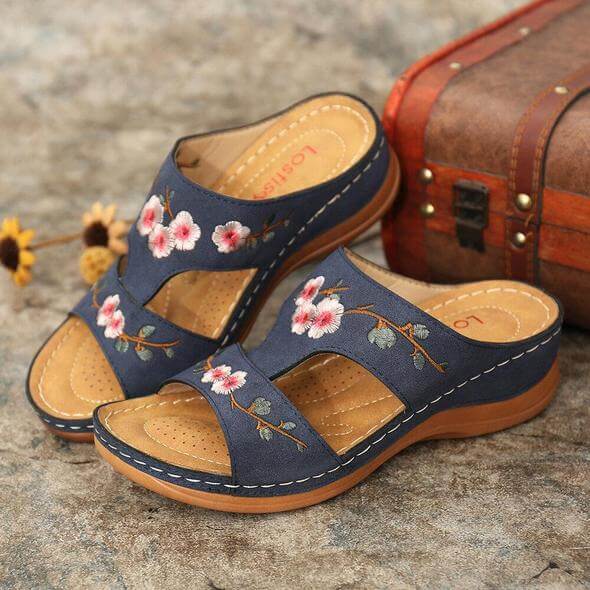 Comfortable Florina orthopedic sandals for women with vibrant floral design, providing arch support.