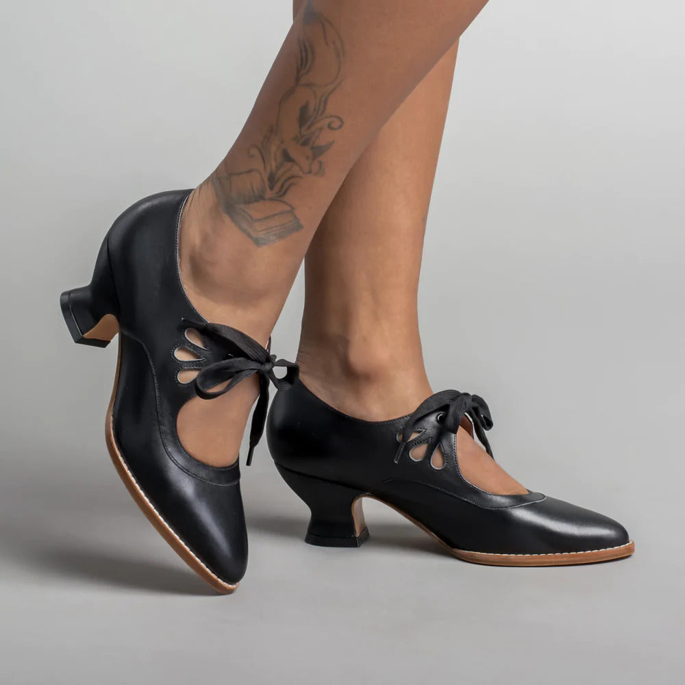 Women's elegant black orthopedic pumps, ensuring all-day comfort with arch and heel support.