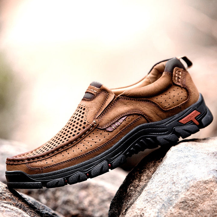 Durable men's hiking shoes with arch support, cushioned insole & non-slip sole for long walks.