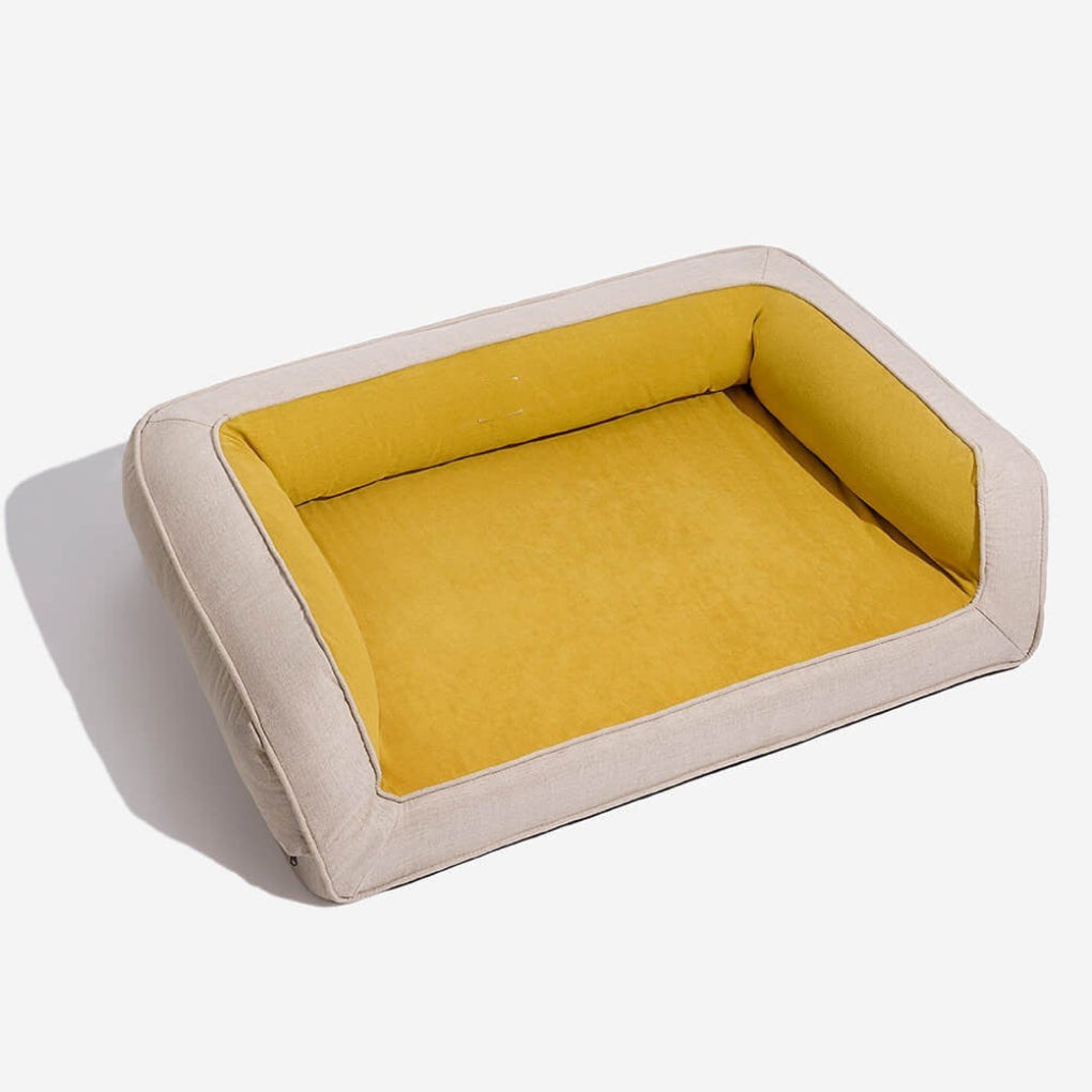 Comfortable orthopedic pet bed with memory foam for hip & joint support. Washable, anti-slip dog sofa.