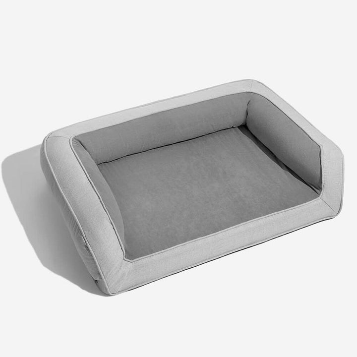 Large dog bed: orthopedic pet sofa with strong joint support. Anti-slip bottom, washable cover for easy care.