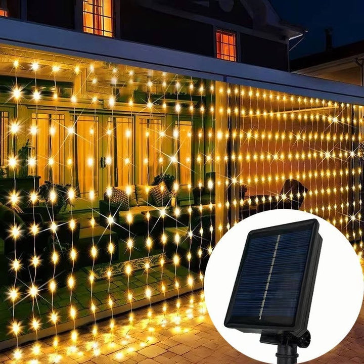 Bright solar curtain lights, an energy-saving solution for patio and garden ambiance.