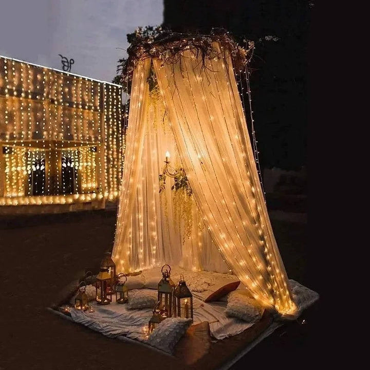 Weatherproof LED solar curtain lights perfect for garden and backyard decoration.