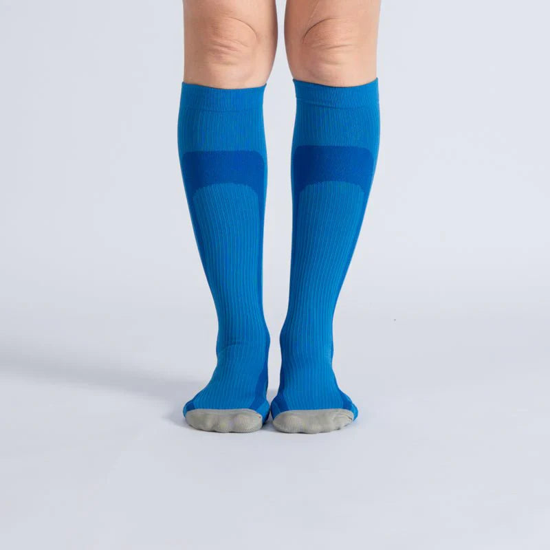 Pair of blue gray unisex gentle compression socks for improved circulation and comfort