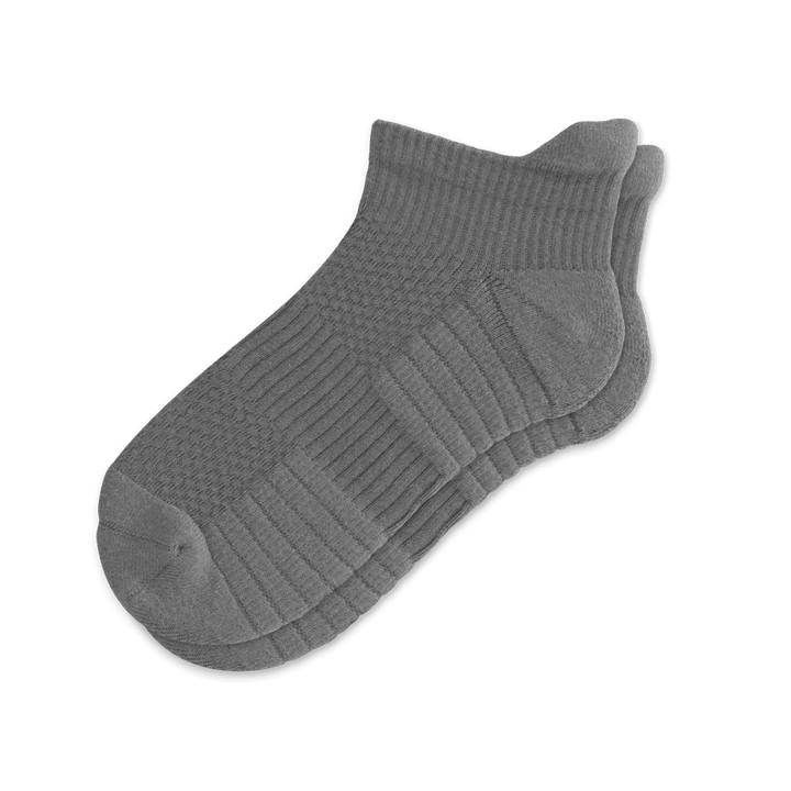 Pair of gray unisex ankle compression socks, ideal for support and comfort during daily wear.