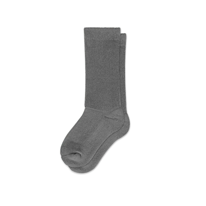 Close-up of the soft fabric of gray unisex circulation socks, promoting comfort and circulation