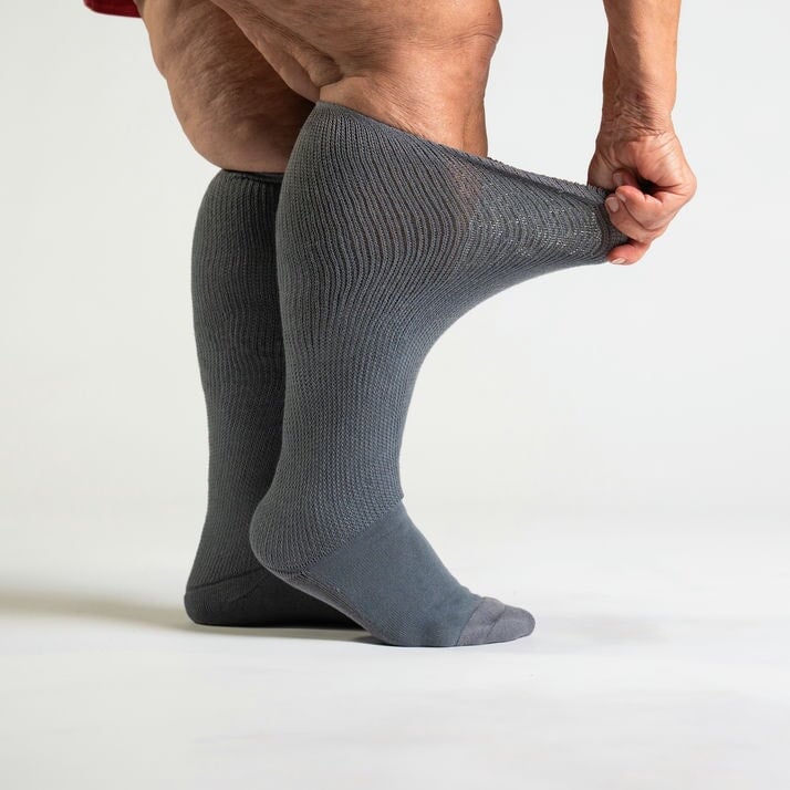 Comfortable gray stretch socks for men and women, featuring circulation-enhancing benefits