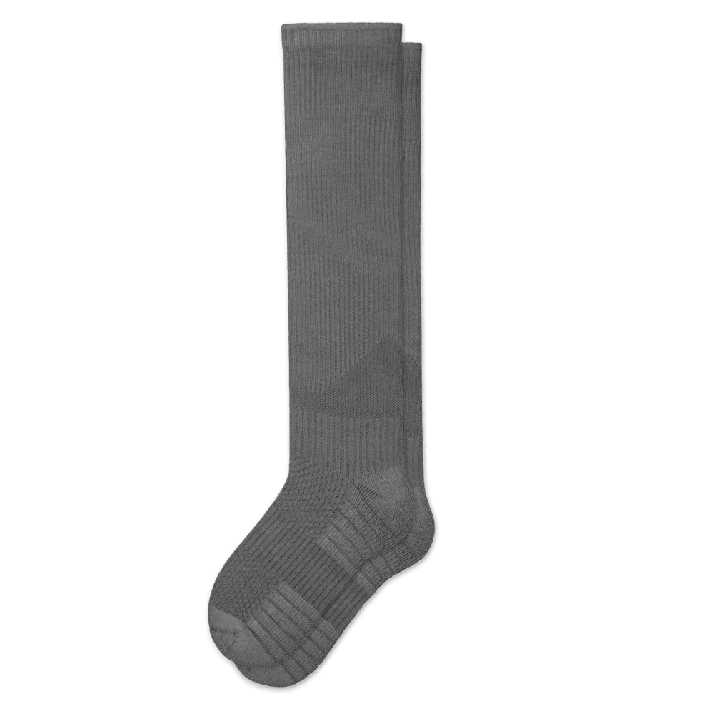Close-up of the fabric texture of gray gentle compression socks, ideal for circulation.